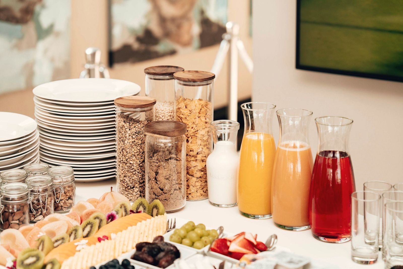 Breakfast buffet with juice, cereal and fruit