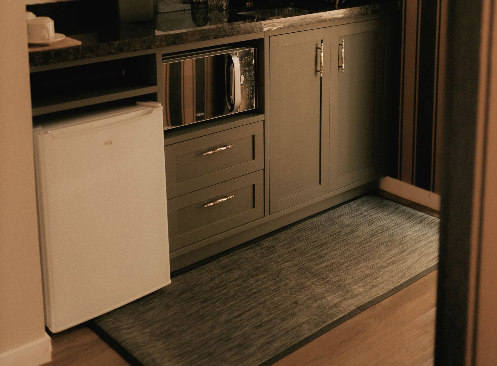 Mini refrigerator and microwave in a guest room
